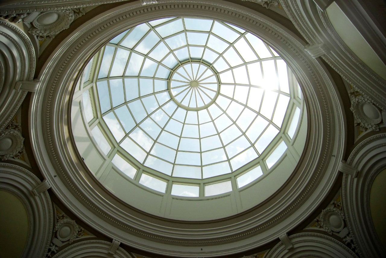 The underside of the Van Wormer Hall dome, showing off decorative architecture.