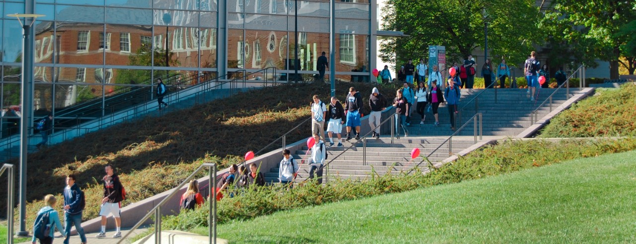Students walk along the steps in front of University Pavilion.